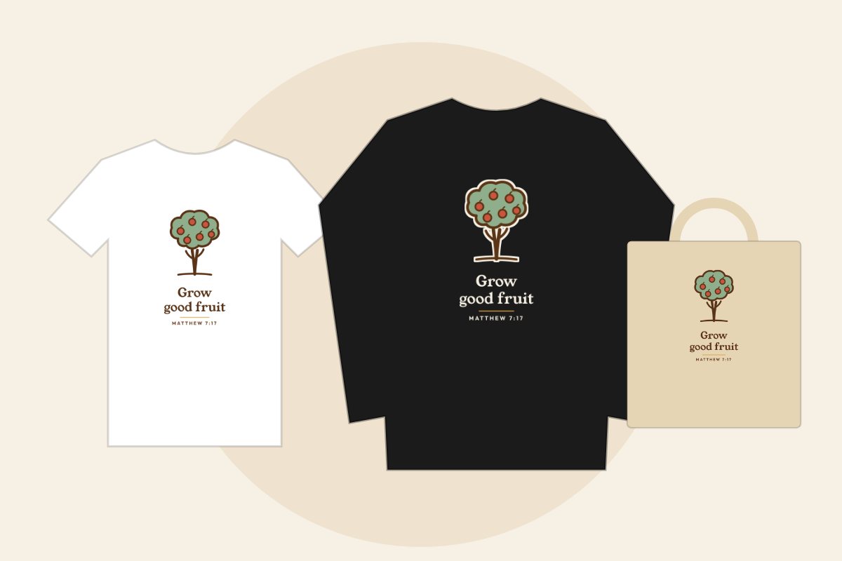 Hand-drawn apple tree with the words Grow good fruit, Matthew 7:17, on a white tee, black sweatshirt and natural tote bag